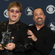 Joel (right), with the subject/producer of a recent rock biopic